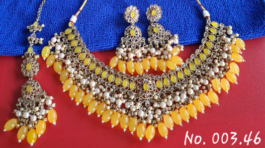 HEAVY YELLOW NECKLACE WITH JHUMKI AND MANG TIKA