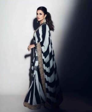 DESIGNER GEORGETTE BLACK AND WHITE PRINT HEAVY LACE BORDER WITH PRE-STITCHED BLOUSE
