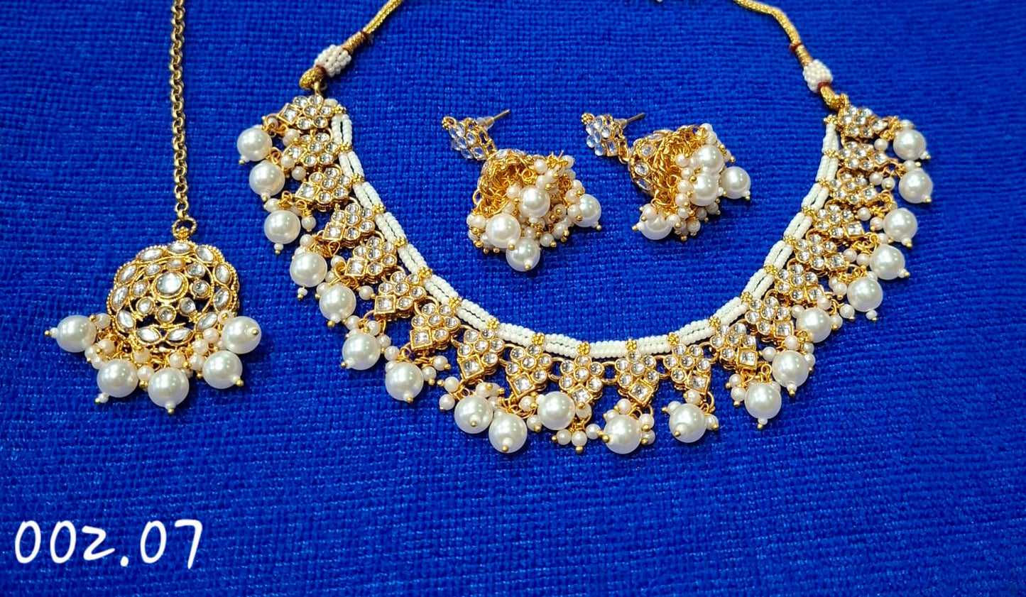 TRENDY CLEAR GOLD NECKLACE EARRINGS WITH MANG TIKA