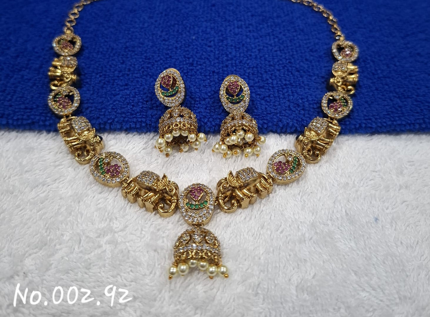 TRENDY BEAUTIFUL GOLD AD ELEPHANT DESIGN NECKLACE WITH JHUMKI